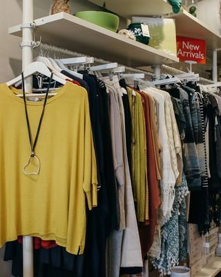 A retail shop floor with rails and shelving